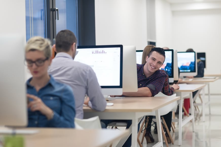 startup business, software developer working on desktop computer at modern office